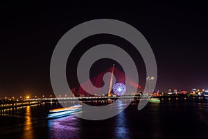 Beautiful Night view of Han river and buildings in Danang city, Vietnam