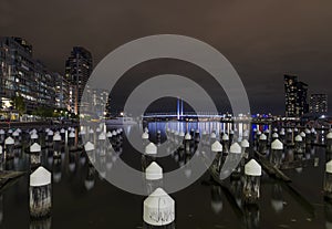 Beautiful night view of Melbourne docklands and Bolte Bridge, with reflections on the Yarra River, Melbourne, Australia photo