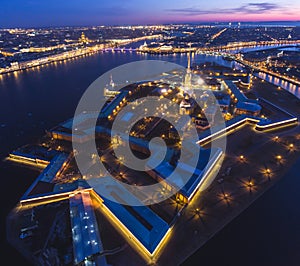 Beautiful night view of Saint-Petersburg, Russia, Peter and Paul Fortress with cityscape and scenery beyond the city