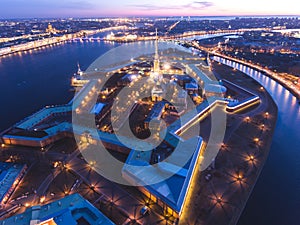 Beautiful night view of Saint-Petersburg, Russia, Peter and Paul Fortress with cityscape and scenery beyond the city