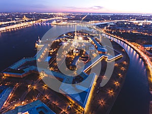 Beautiful night view of Saint-Petersburg, Russia, Peter and Paul Fortress with cityscape and scenery beyond the city