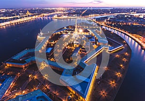 Beautiful night view of Saint-Petersburg, Russia, Peter and Paul Fortress with cityscape and scenery beyond the city