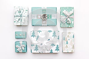 Beautiful nordic christmas gifts isolated on white background. Turquoise colored wrapped xmas boxes. Gift wrapping.