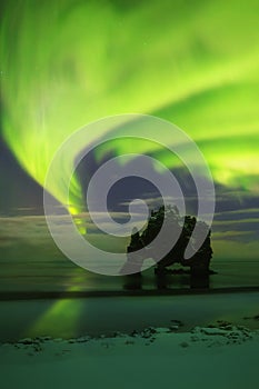 This beautiful northern lights or aurora borealis in Iceland was taken at around Reynisdrangar near VÃ­k Ã­ MÃ½rdal