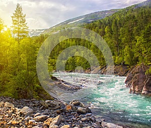 Beautiful Norway landscape with mountains and ice cold river