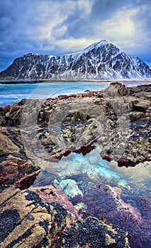 Beautiful Norway landscape of picturesque arctic beach in cold Norwegian Sea