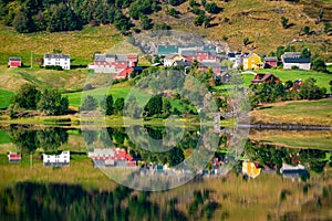 Beautiful Norwegian Houses reflection in Granvinsvatnet lake Norway, Scandinavia, Europe