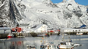 Beautiful Norwegian winter landscape with the multicolored rorbu