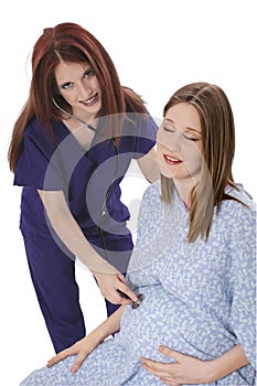 Beautiful Nurse Examines Expecting Mother