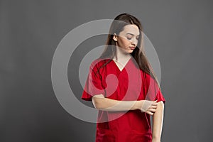 Beautiful nurse fitting her  new hospital scrubs