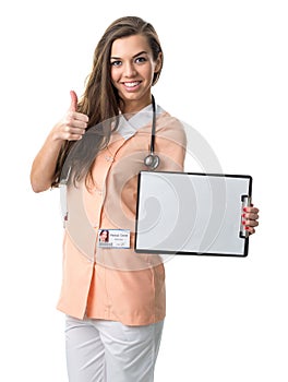 Beautiful nurse holding a folder, showing success photo