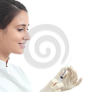 Beautiful nurse preparing a syringe