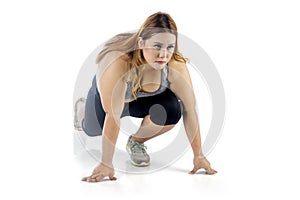 Beautiful obese woman in ready pose to run