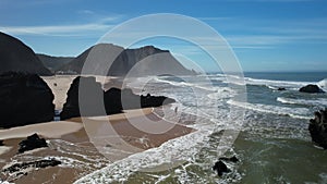 Beautiful ocean view of the Praia de Adraga, a wild place near touristic Cabo da Roca lighthouse, Portugal