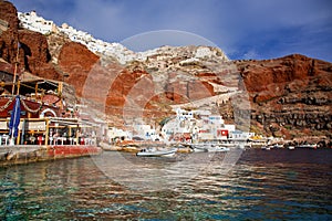 beautiful Oia town and caldera from old port Amoudi, Santorini island in Aegean sea, Greece