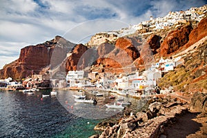 beautiful Oia town and caldera from old port Amoudi, Santorini island in Aegean sea, Greece