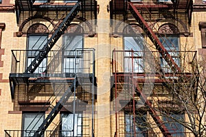 Beautiful Old Apartment Building Exterior with Fire Escapes in New York City