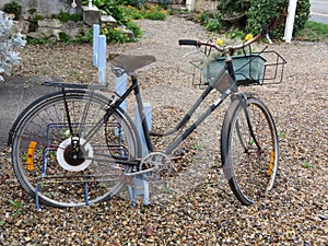 Beautiful old bike bike used for gardener and decoration photo