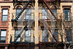 Beautiful Old Apartment Building Exterior with Fire Escapes in New York City