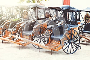 A beautiful old carriage in the park.