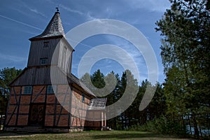 old charming church surrounded by greenery