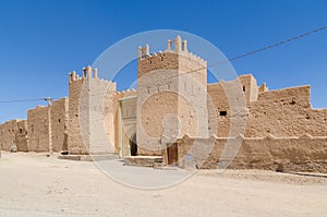 Beautiful old clay building called a kasbah in desert of Morocco, North Africa