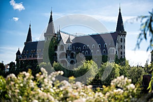 Beautiful old fairy-tale castle near Burgas, Bulgaria. Walls of the castle and flower garden