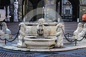 Beautiful old fountain in the center of Bergamo in Italy