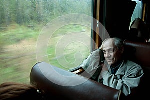 Beautiful old man in the train