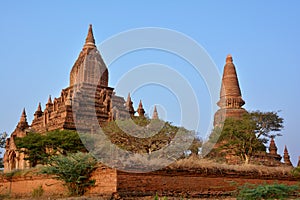 Beautiful old pagodas at the sunset in Bagan archeological zone, Myanmar.