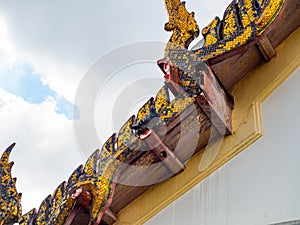 Beautiful old roof designed by Thai people,Temple name is Wat Arun Ratchawararam Woramahaviharn at Bangkok Thailand