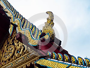 Beautiful old roof is texture colors Gold,Designed by Thai people,Temple name is Wat kaew at Bangkok Thailand