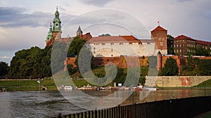 Beautiful old royal Wawel Castle on the banks of Vistula river in the evening. The main historical landmark of Krakow, a popular