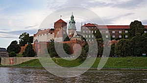 Beautiful old royal Wawel Castle on the banks of Vistula river in the evening. The main historical landmark of Krakow, a popular