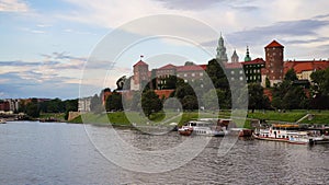 Beautiful old royal Wawel Castle on the banks of Vistula river in the evening. The main historical landmark of Krakow, a popular