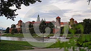 Beautiful old royal Wawel Castle on the banks of Vistula river in the evening. The main historical landmark of Krakow, a popular