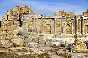 Beautiful old ruins on a Sunny summer day. Ruins of a Byzantine city, destroyed the house, columns, stones and walls with ornament