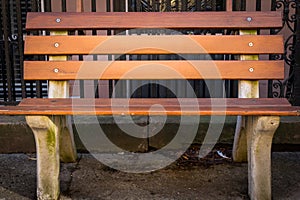 Beautiful old street bench, in New York City`s Harlem neighborhood, Upper Manhattan, NYC, USA, close-up