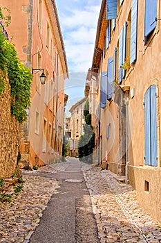 Old street in the village of Vaison la Romain, Provence, France photo