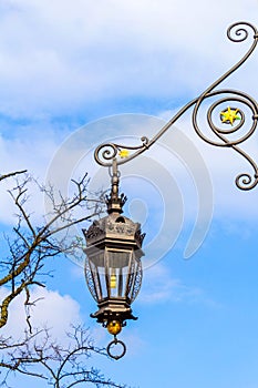 Beautiful old style street lamp at the Cloth Hall in Cracow, Poland