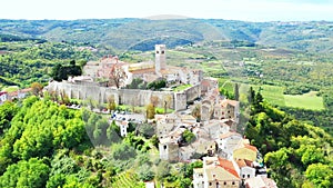 Beautiful old town of Motovun, stone houses and church tower bell, romantic architecture in Istria, Croatia