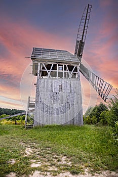 Beautiful old windmill during sunset