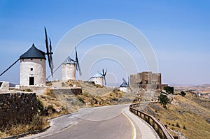 Beautiful and old windmills painted in white
