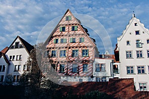 old wooden beam houses with white and orange plaster. Fishermen\'s Quarter. Ulmer Stadtmauer. Fachwerk. Ulmer Muenster photo