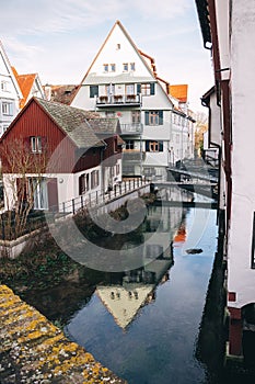 old wooden beam houses with orange plaster. Fishermen\'s Quarter. Ulmer Stadtmauer. Fachwerk. Ulmer Muenster photo
