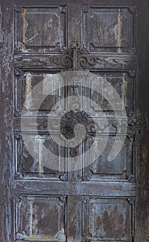 Beautiful old wooden door detail at the pilgrimage Church Maria Strassengel, a 14th century Gothic church in the town of Judendorf