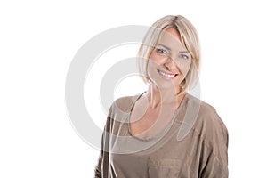 Beautiful older blond attractive isolated woman smiling with white teeth.