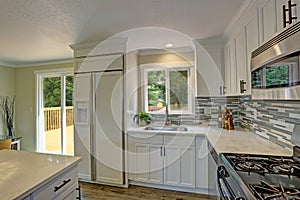 Beautiful open plan second floor white kitchen