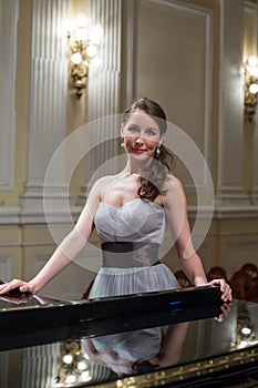 Beautiful opera singer in the concert hall