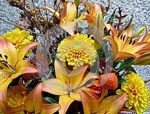 Beautiful orange lilies and chrysanthemum flowers